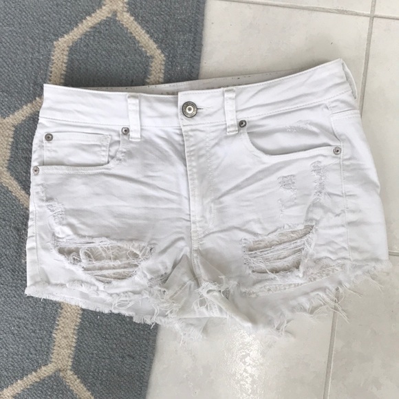 white distressed jean shorts